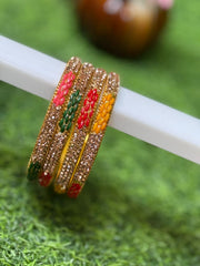 GOLD TONE METAL BANGLES