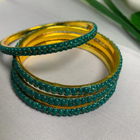 Emerald Aura Sparkle Bangles Set