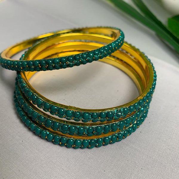 Emerald Aura Sparkle Bangles Set