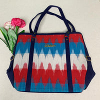 Crimson Rhythm Ikat Tote Bag.