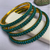 Emerald Aura Sparkle Bangles Set