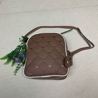 Urban Bow Charm Sling Bag