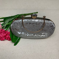 Rosegold Radiance Clutch