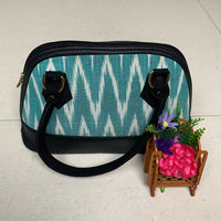 Deprise Aqua Ikat Charm Sling Bag
