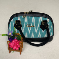 Deprise Aqua Ikat Charm Sling Bag
