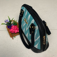 Deprise Aqua Ikat Charm Sling Bag