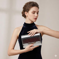 Gold box-shaped sling bag.