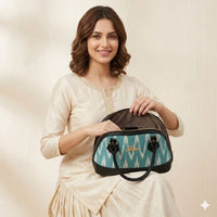 Deprise Aqua Ikat Charm Sling Bag