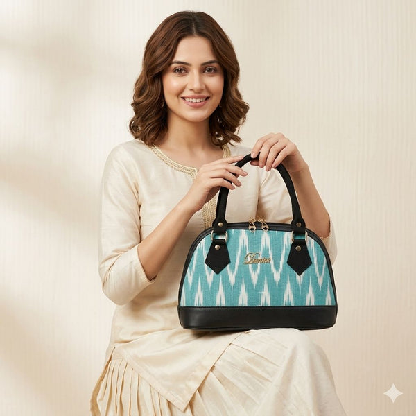 Deprise Aqua Ikat Charm Sling Bag