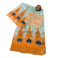 Mulmul Cotton Saree with Grid Pattern and Floral Bootis