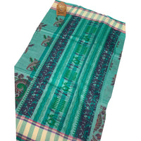 Linen Saree with Traditional Circular Motifs.