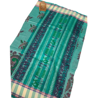 Linen Saree with Traditional Circular Motifs.