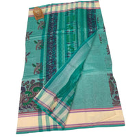 Linen Saree with Traditional Circular Motifs.