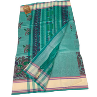 Linen Saree with Traditional Circular Motifs.